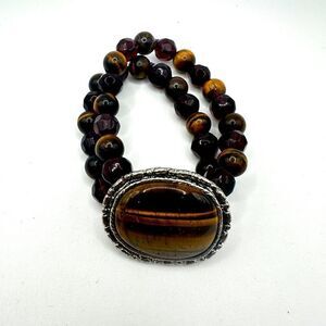 Stunning tigers eye and possible faceted garnet beaded stretchy bracelet!